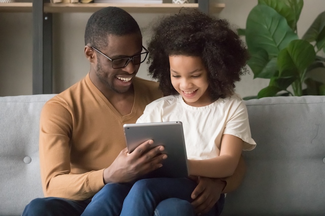 Should You Open a Child Bank Account with a Debit Card? 39 father daughter tablet online bank account minor