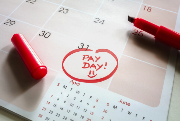 a calendar with the words "pay day" circled at the end of the month.