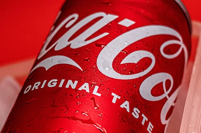 10 Items You Should Never Buy at Aldi 4 a coca-cola can close-up.