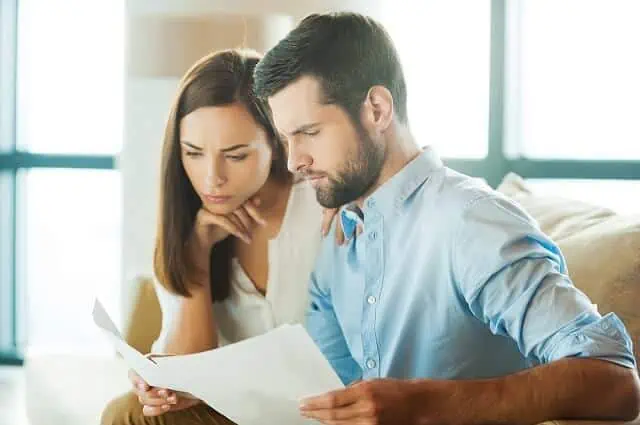 couple reviewing financial documents together