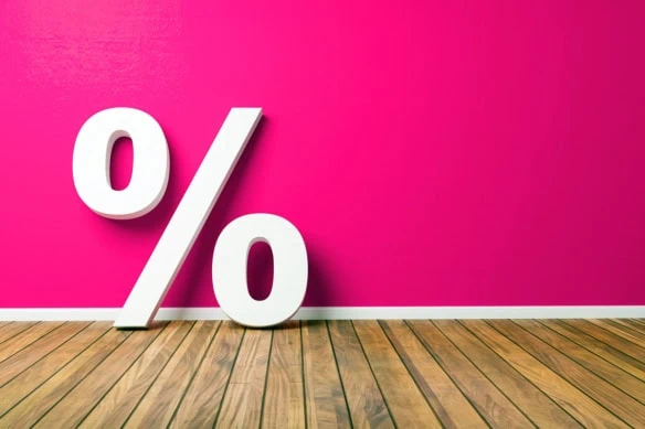 a giant percent sign against a pink background.