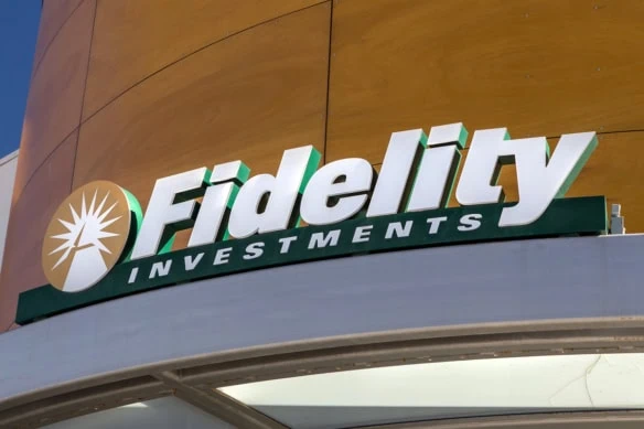 a green fidelity investments sign on the side of a building.