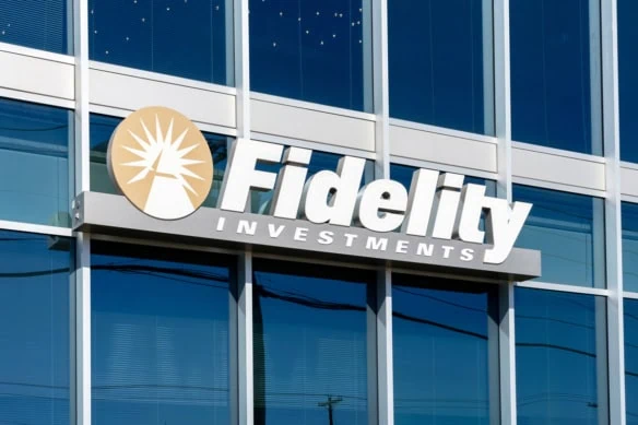a fidelity investments sign on the side of a glass building.