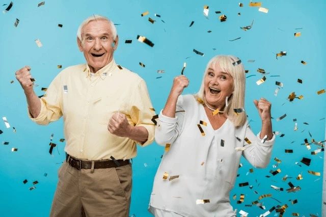 10 Frugal Habits That Make Retirees' Lives Better 7 happy seniors elderly couple celebrating