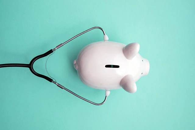 10 Best ETFs to Beat Back a Bear Market 12 piggy bank with stethoscope.
