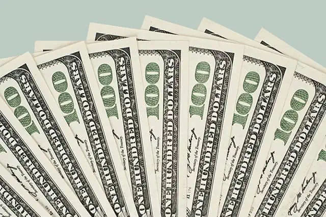 Saver’s Credit: What Is It, How Much, Who’s Eligible + More 4 hundred dollar bills money cash