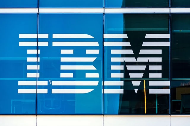IBM sign and logo on glass facade of IBM Watson modern office building in SOMA california.