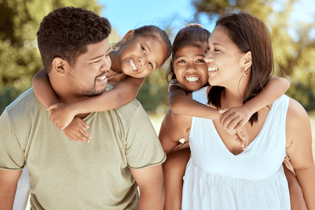 Earned Income Tax Credit (EITC) – How Much, Eligibility + More 3 kids parents family children vacation