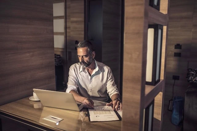 5 New Tax Deductions In the 'One Big Beautiful Bill' 11 middle aged man working job late at night 640