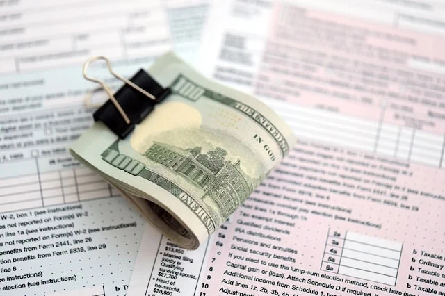 Is a Roth Conversion Worth the Tax Bill? What to Weigh Before You Act 2 money cash tax forms roth ira conversion 640