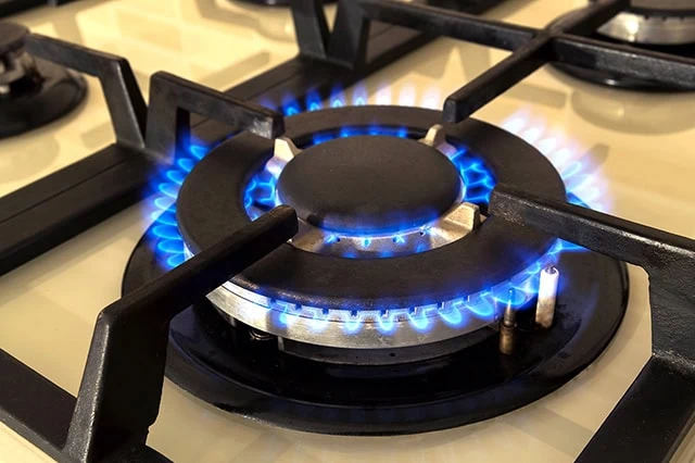The Best Dividend Stocks: 10 Pro-Grade Income Picks for 2025 14 flames come out of a gas range.