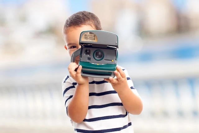 old technology instant camera kid 640
