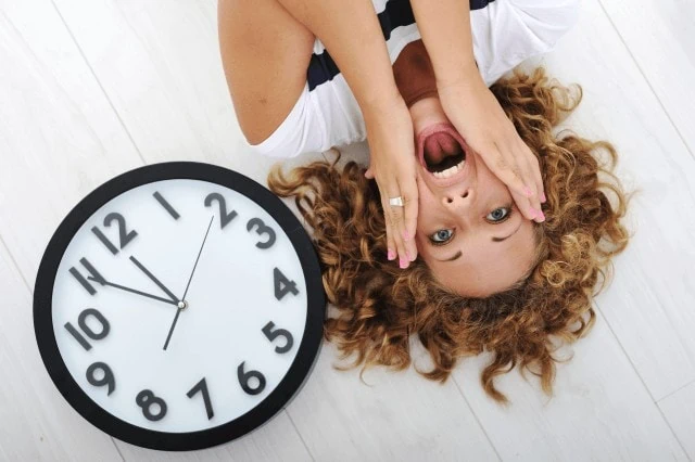 When Should You Hire a Tax Pro? 15 Times It Makes Sense 16 panic woman upside down clock deadline