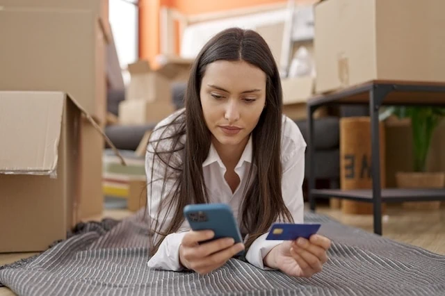 Are Credit Cards Safer than Debit Cards? Credit v. Debit Security 5 paying rent smart phone credit card