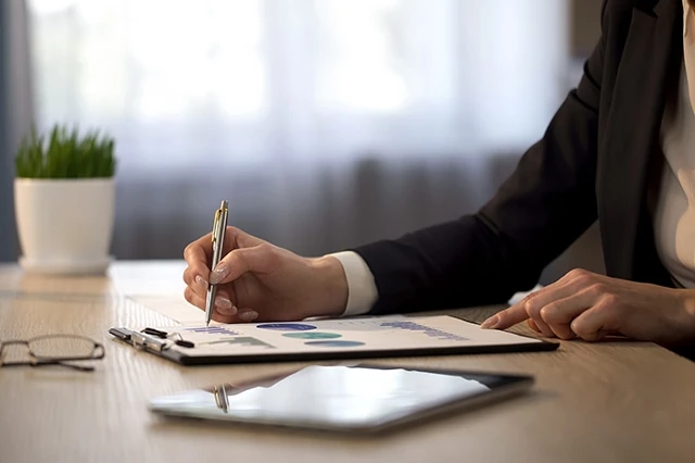 looking at statistical graphs, loan review check, financial balance, stock footage