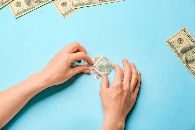 Is Your Personality Limiting Your Income? Here's What the Research Says 2 personality income origami money 640