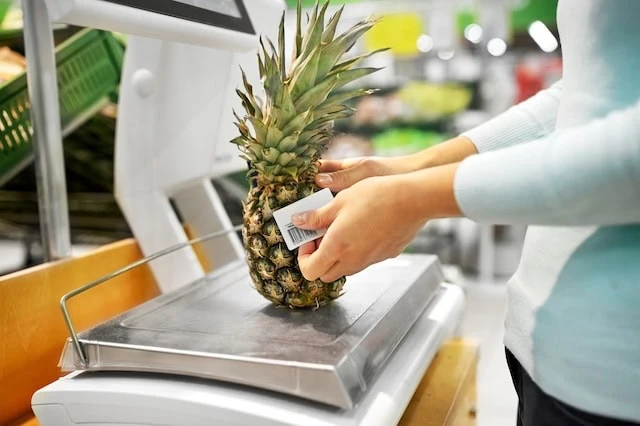 10 Sneaky Grocery Store Scams to Avoid 6 pineapple bar code price weighing grocery 640