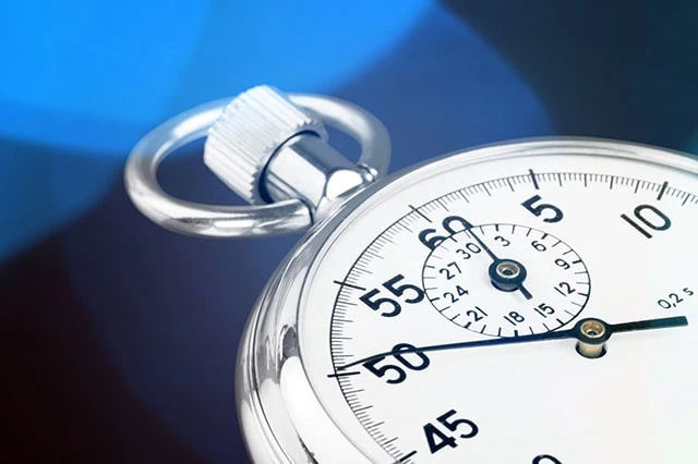 Best Schwab Retirement Funds for a 401(k) Plan 5 a stopwatch against a blue background.