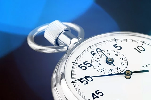10 Best ETFs to Beat Back a Bear Market 13 a stopwatch against a blue background.