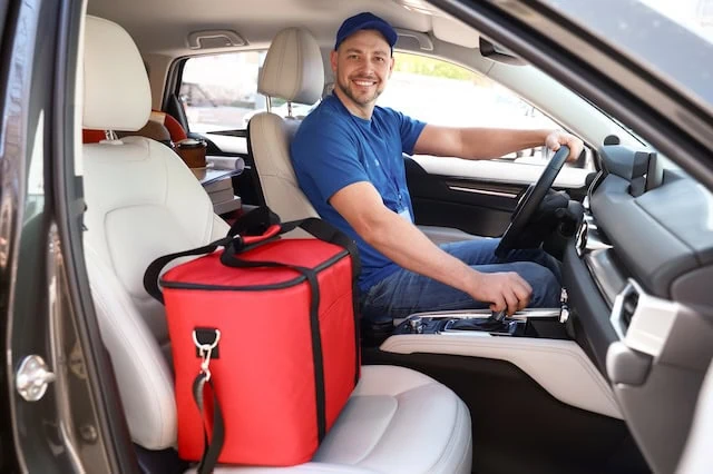 Budgeting Priorities If You're Laid Off 9 side hustle uber lyft food delivery driver