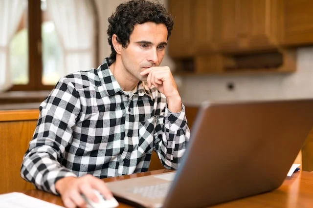 Are You Saving Enough for Retirement? 6 thinking man online search laptop 401k