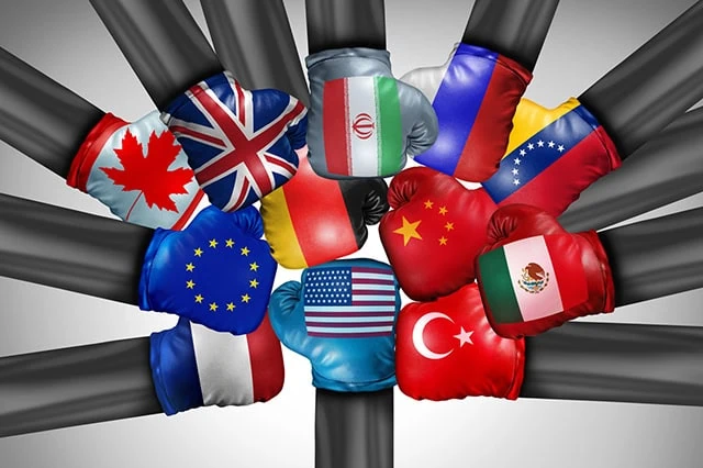 How Do the Trump Tariffs Work Now? 6 a united states boxing glove tries to punch boxing gloves of many other countries.