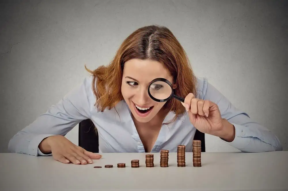 woman examining penny stocks