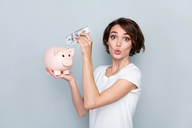 Are You Saving Enough for Retirement? 3 woman placing money in a piggy bank