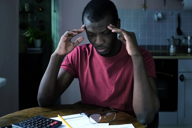 Tax Day 2025: When Is the Last Day to File Taxes? 11 worried man taxes rent late payments bills